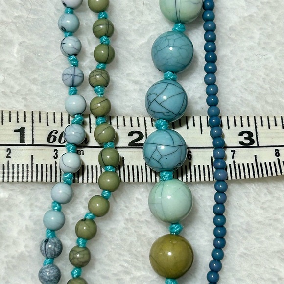 Pressed Turquoise 4 stranded Beaded Necklace with leather & wood Accents 24” - Picture 9 of 10